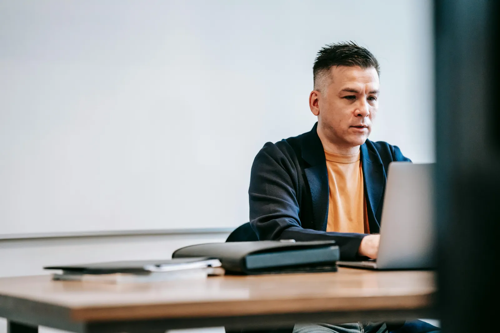 a man sitting at a desk
