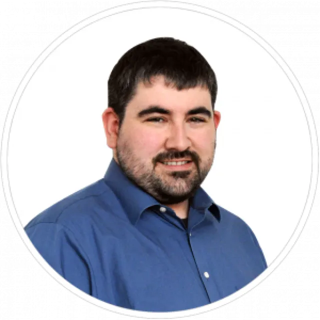 a man smiling for the camera