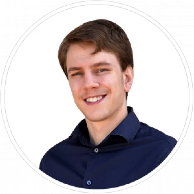 a man smiling for the camera